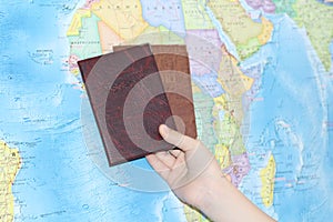 Identity document on the background of a geographical map