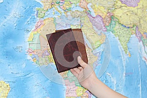 Identity document on the background of a geographical map