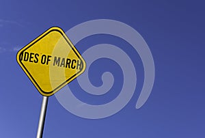 Ides of March - yellow sign with blue sky background