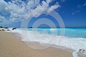 Idilic Ionian peble beach with turqouise water