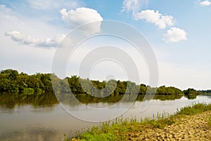 Idillyc rural riverside landscape photo