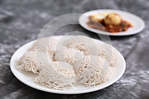 Idiyappam steam cooked rice noodles with egg masala