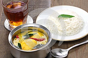 Idiyappam (string hoppers) with egg curry photo