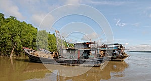 Idle boats waiting on Mekong river