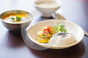 idli with coconut chutney and spicy lentils