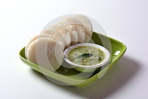 Idli with Sambar in bowl on white background, Indian Dish