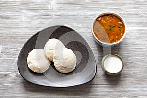 Idli Sambar steamed dumplings with sauses