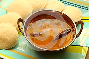 Idly with sambar Iddli is a traditional breakfast of South Indian households,its a very popular savory dish of South Indian