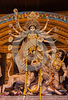 Idol of goddess durga and colourful pandal photo