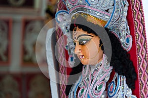 Idol of Hindu Goddess Durga. Close up, selective focus.
