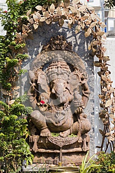 idol of lord ganesha for worshipping during ganesh chaturthi festival in maharashtra india. shot against black background