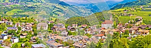 Idyllic alpine village of Gudon architecture and landscape panoramic view