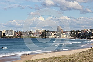 Idyllic Australian beach bay with town