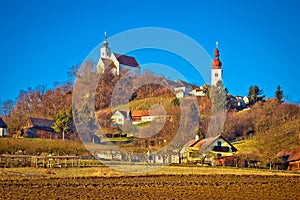 Idyllic austrian village of Straden on green hill view