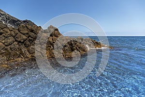 Idyllic beach of Barronal with blue and transparent waters in the Natural Park of Cabo de Gata and Njar in Almera photo