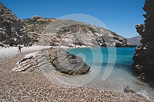 Idyllic beach with a crystal-clear ocean view, featuring a rocky shoreline in Kythera Island