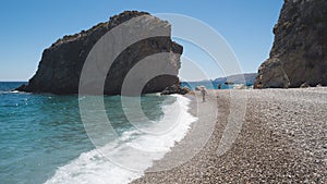 Idyllic beach with a crystal-clear ocean view, featuring a rocky shoreline in Kythera Island