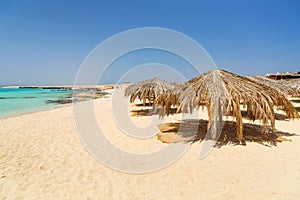 Idyllic beach of Mahmya island with turquoise water