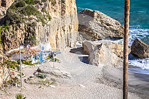 Idyllic beach in Nerja landscape view