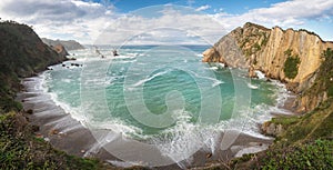 Idyllic coastline panorama landscape in Cantabric sea, Playa del silencio, silence beach Asturias, Spain photo