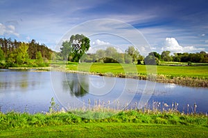 Idyllic golf course at the pond