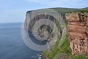 Idyllic image of rugged cliffs situated on a pristine shoreline