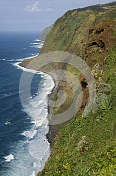 Idyllic landscape with ocean, surf, mountains