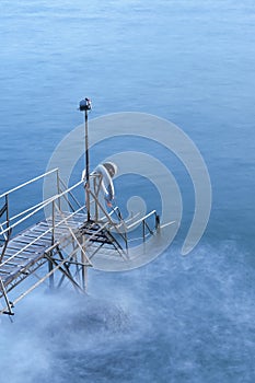 Idyllic landscape of wooden jetty and shore