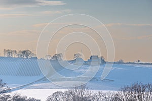An idyllic midwinter scene in the Dutch forests in the rolling hills landscape in the south of Limburg
