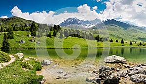 Idyllic mountain lake landscape in the Swiss Alps near Alp Flix