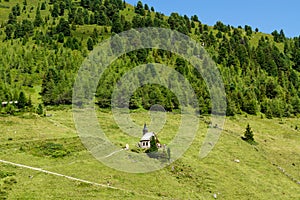 Idyllic mountain scenery with little church in the Alps. Austria, Zillertal High Road, Tirol