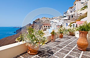 Idyllic patio with flowers in Fira town on the island of Thera(Santorini), Greece.