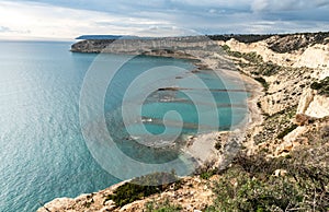 Idyllic seascape below the dramatic cliffs. Zapalo bay, Episkopi Limassol Cyprus