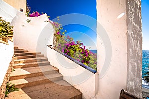 Idyllic stairs to beach in Nerja panoramic view photo