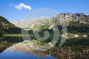 Idyllic summer landscape with clear mountain lake