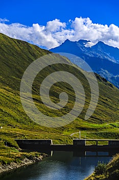 Idyllic summer landscape with clear mountain lake