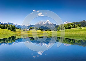 Idyllic summer landscape with mountain lake in the Alps photo