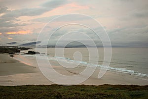 idyllic sunset in a Cantabrian beach photo