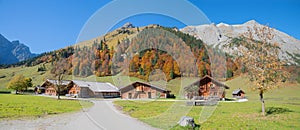 Idyllic tourist destination Eng Alm huts, karwendel mountains and landscape in autumn