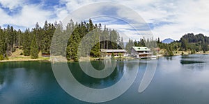 Idyllic tranquil Lake Frauensee in spring embedded to forest photo