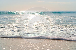 Idyllic tropical beach with white sand, turquoise ocean water and blue sky on Caribbean island