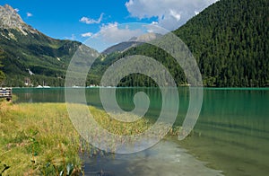 Idyllic view of Anterselva lake in Alto Adige during summer day of september, Italy photo