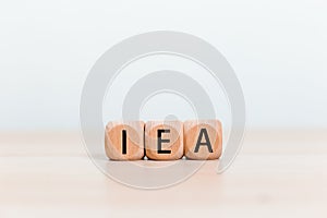 IEA on Wooden cube. International Energy Agency