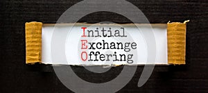 IEO initial exchange offering symbol. Concept words IEO initial exchange offering on beautiful paper. Beautiful black paper