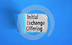 IEO initial exchange offering symbol. Concept words IEO initial exchange offering on beautiful paper. Beautiful blue paper