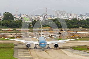 ietnam Airlines Boeing 787-9 Dreamliner Taxiing On Runway Of Tan Son Nhat International Airport, Vietnam.