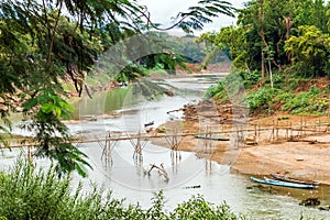 Iew of the bamboo bridge on the river Nam Khan, Luang Prabang, L