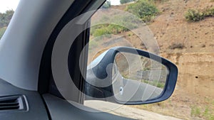 Iew in the side mirror of a car, Travel and trip concept