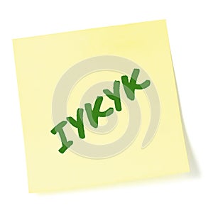 If you know, you know acronym IYKYK green marker text macro closeup isolated gen Z jokes yellow adhesive post-it sticky note photo