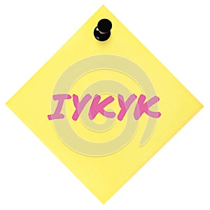 If you know you know acronym IYKYK text macro closeup pink marker Tiktok jokes concept isolated yellow adhesive post-it note photo